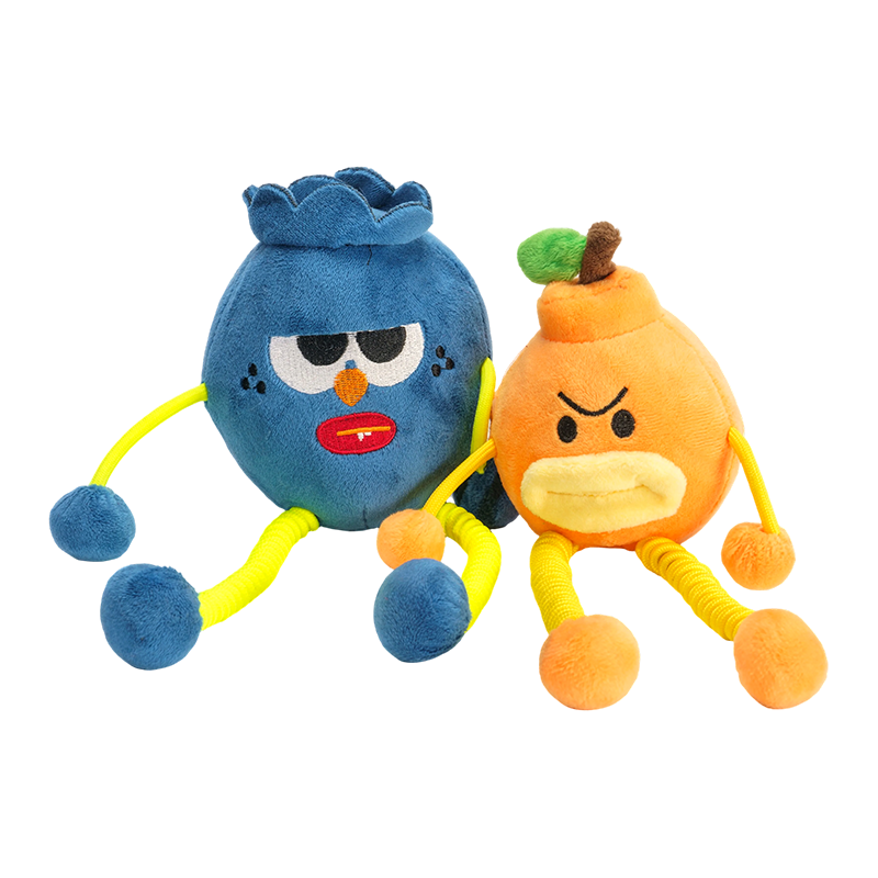 Nukkige bosbessen- en woedende oranje pluche sleutelhangers