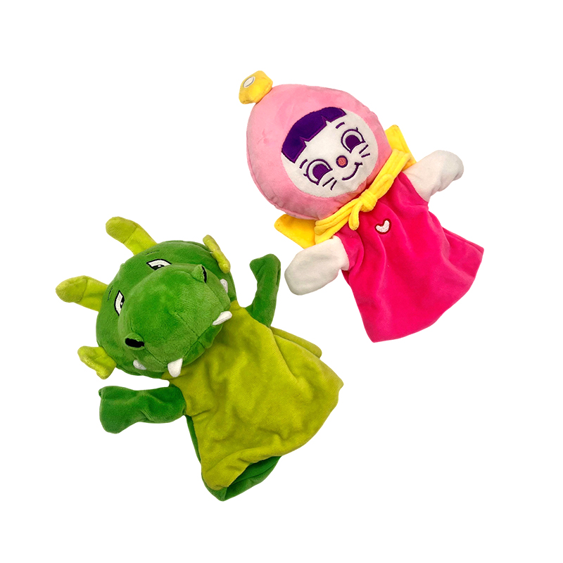 Vingerpoppetjes van roze meisje en groene draak